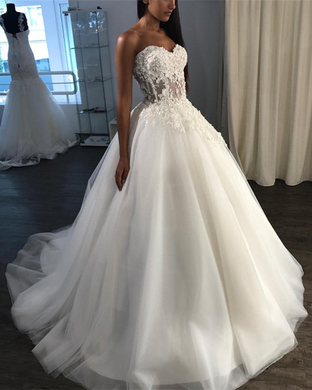 http://www.alinanova.com/cdn/shop/products/See-Through-Corset-Wedding-Dresses-Ball-Gown-Tulle-Sweetheart-Appliques.jpg?v=1641819029