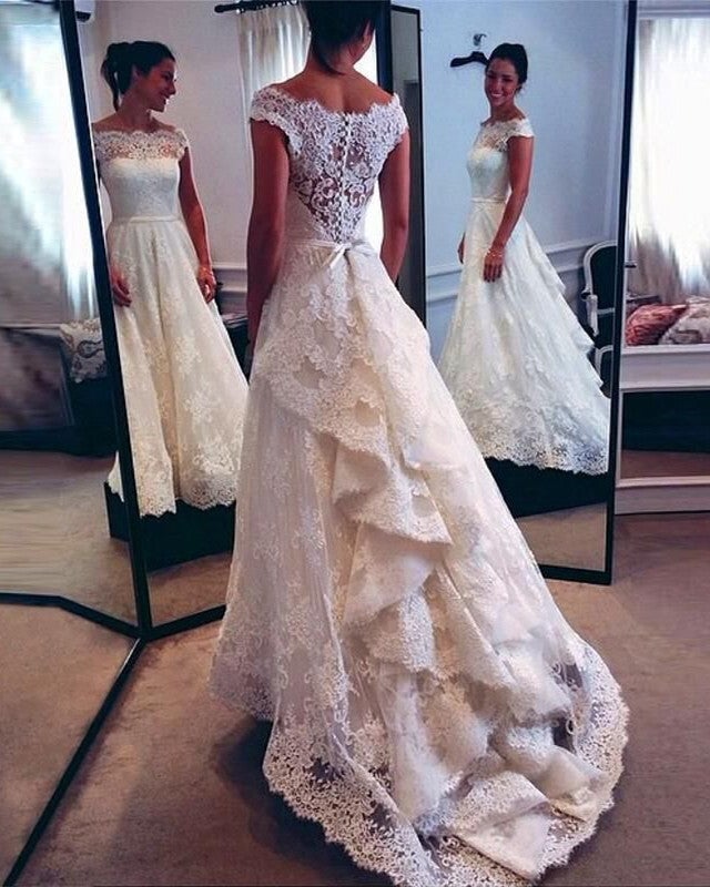 http://www.alinanova.com/cdn/shop/products/Vintage-Scoop-Neckline-Lace-Wedding-Dresses-Bustle-Style-Bridal-Gowns.jpg?v=1641818467